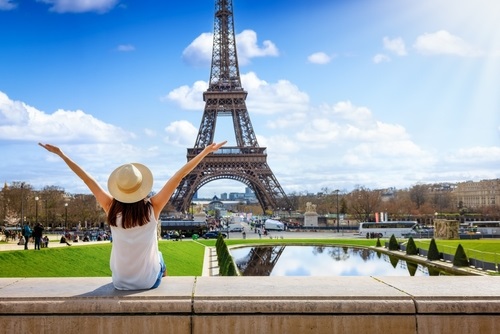 A,Tourist,Woman,Enjoys,The,Beautiful,View,Of,The,Eiffel